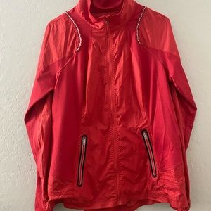 Red lightweight Lululemon out door running jacket with ruffle detail